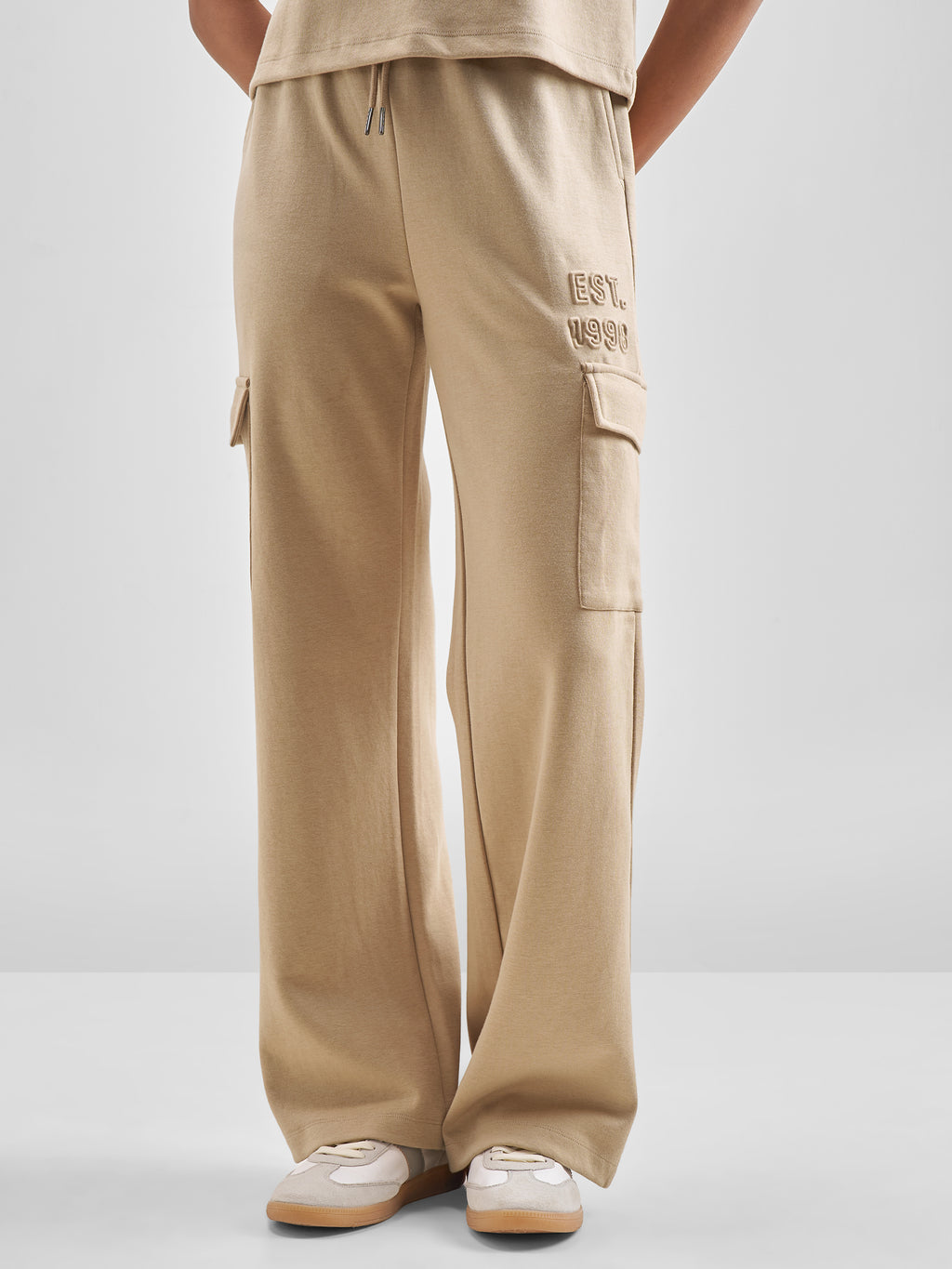 Street By Tokyo Talkies Women Beige Solid Straight Fit Cargos - Beige - Image 1