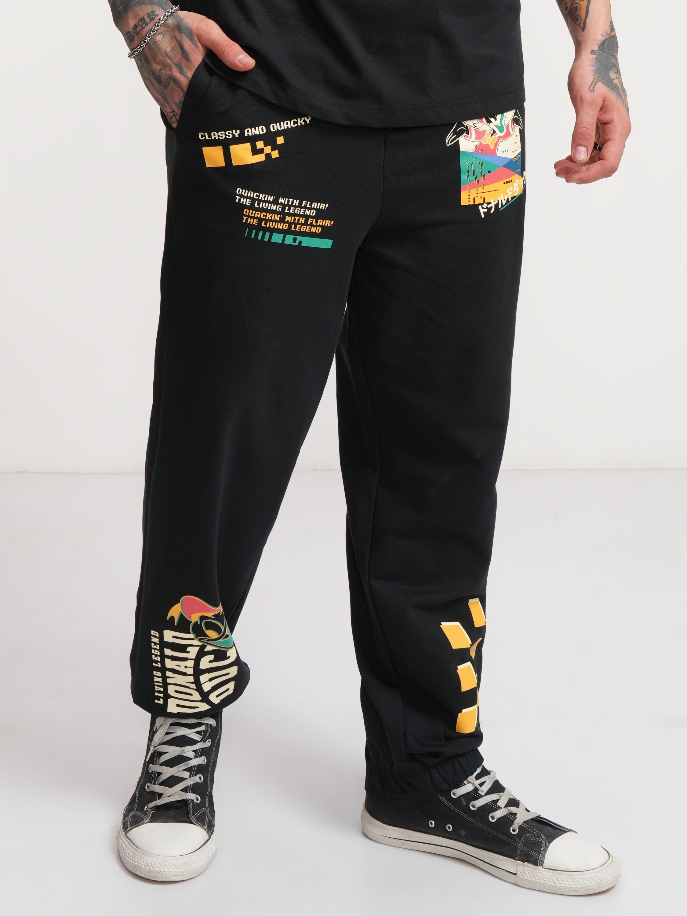 Disney By Highlander Men Black Donald Duck Printed Baggy Fit Joggers - Black - Image 1