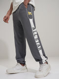 Disney By Highlander Men Grey Mickey Mouse Loose Fit Solid Joggers - Grey - Image 1