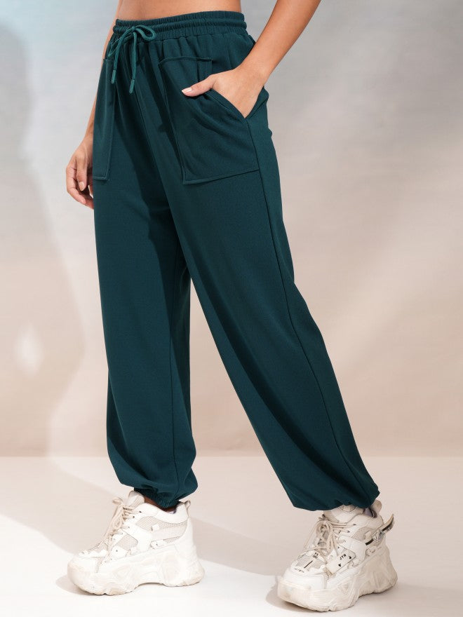 Tokyo Talkies Women Teal Regular Solid Joggers - Teal - Image 4