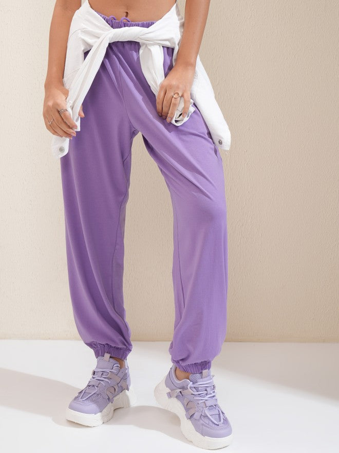 Tokyo Talkies Women Lavender Solid Regular Fit Joggers - Lavender - Image 1