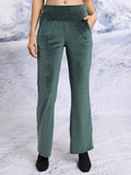 Tokyo Talkies Women Green Solid Flared Casual Trouser - Green - Image 1