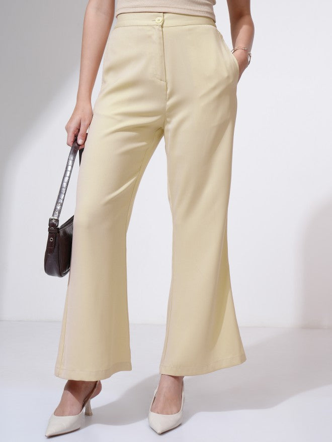 Tokyo Talkies Women Beige Solid Flared Casual Trouser - Beige - Image 1