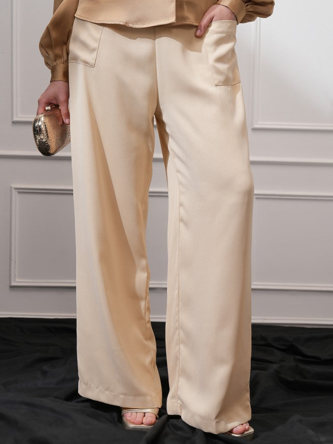 Tokyo Talkies Women Beige Solid Flared Casual Trouser - Beige - Image 1