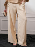 Tokyo Talkies Women Beige Solid Flared Casual Trouser - Beige - Image 1