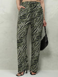 Tokyo Talkies Women Olive Printed Flared Casual Trouser - Olive - Image 1