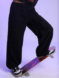 Tokyo Talkies Women Black Loose Fit Solid Casual Trouser - Black - Image 1