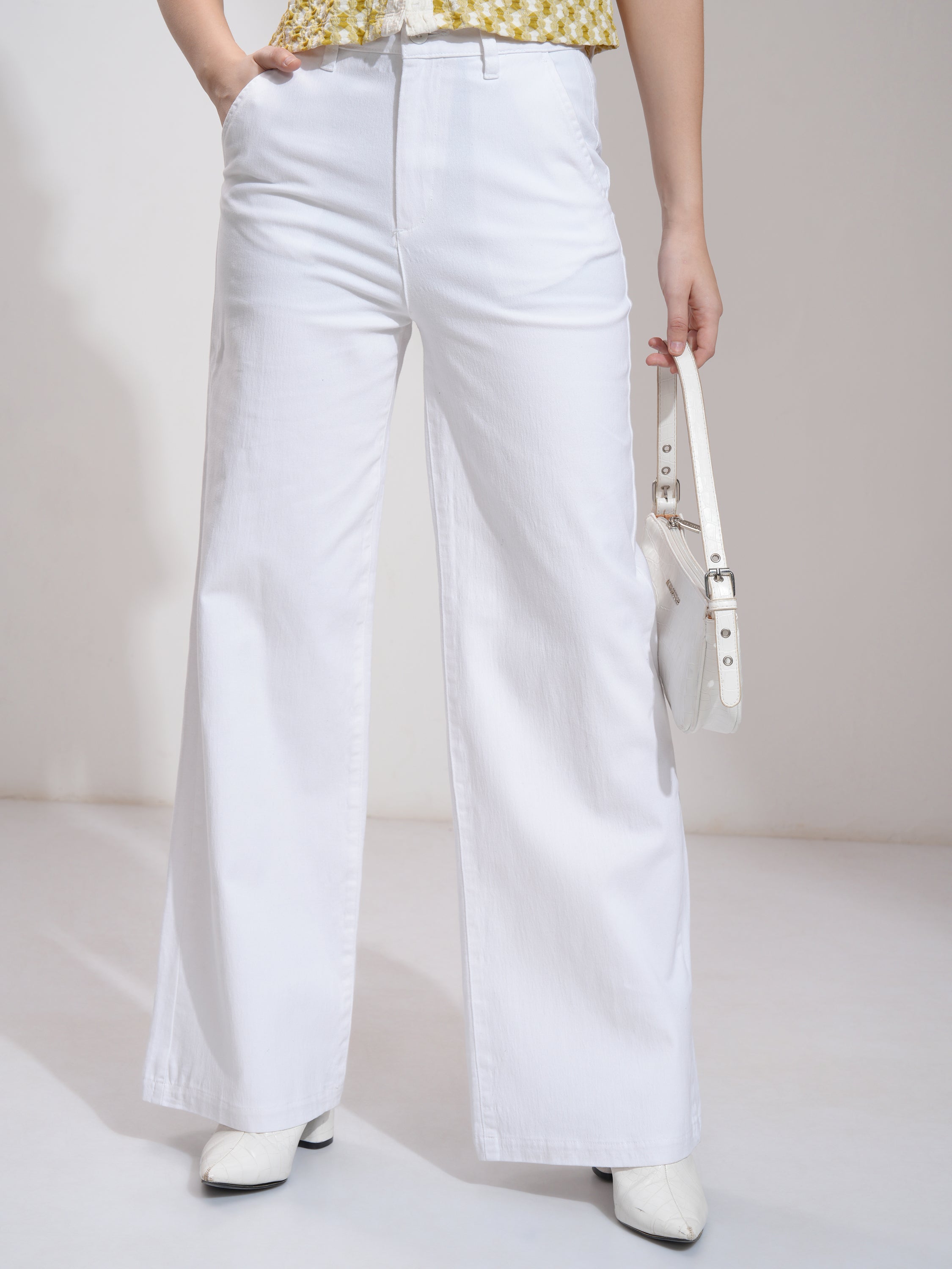 Tokyo Talkies Women White Solid Flared Casual Trouser - White - Image 1