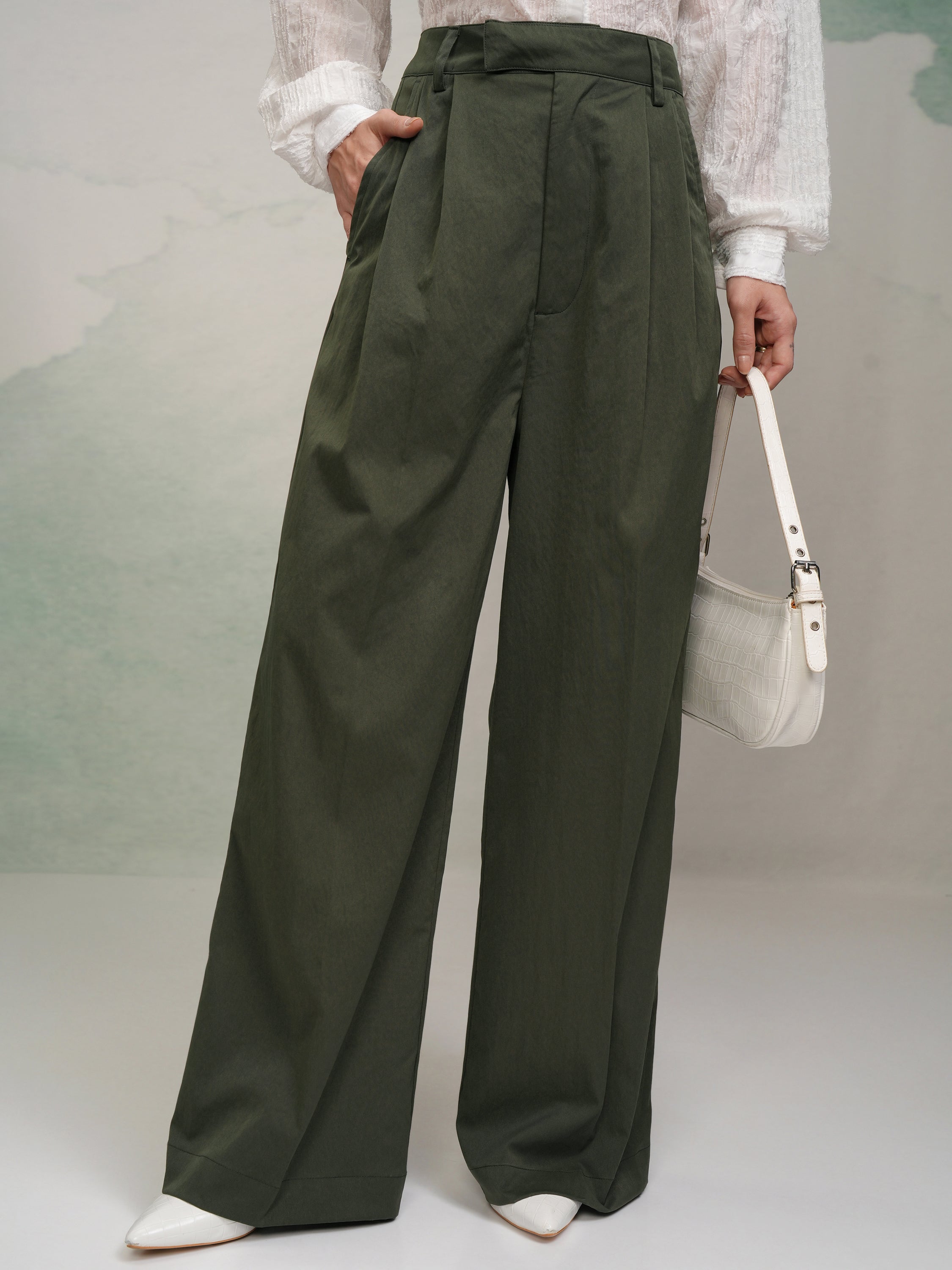 Tokyo Talkies Women Green Solid Flared Casual Trouser - Green - Image 1