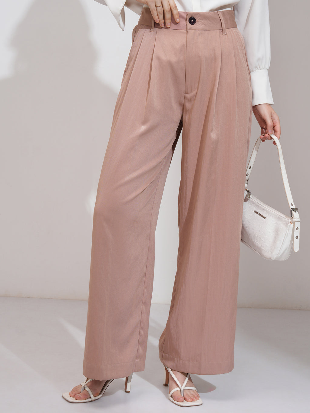 Tokyo Talkies Women Peach Solid Flared Casual Trouser - Peach - Image 1