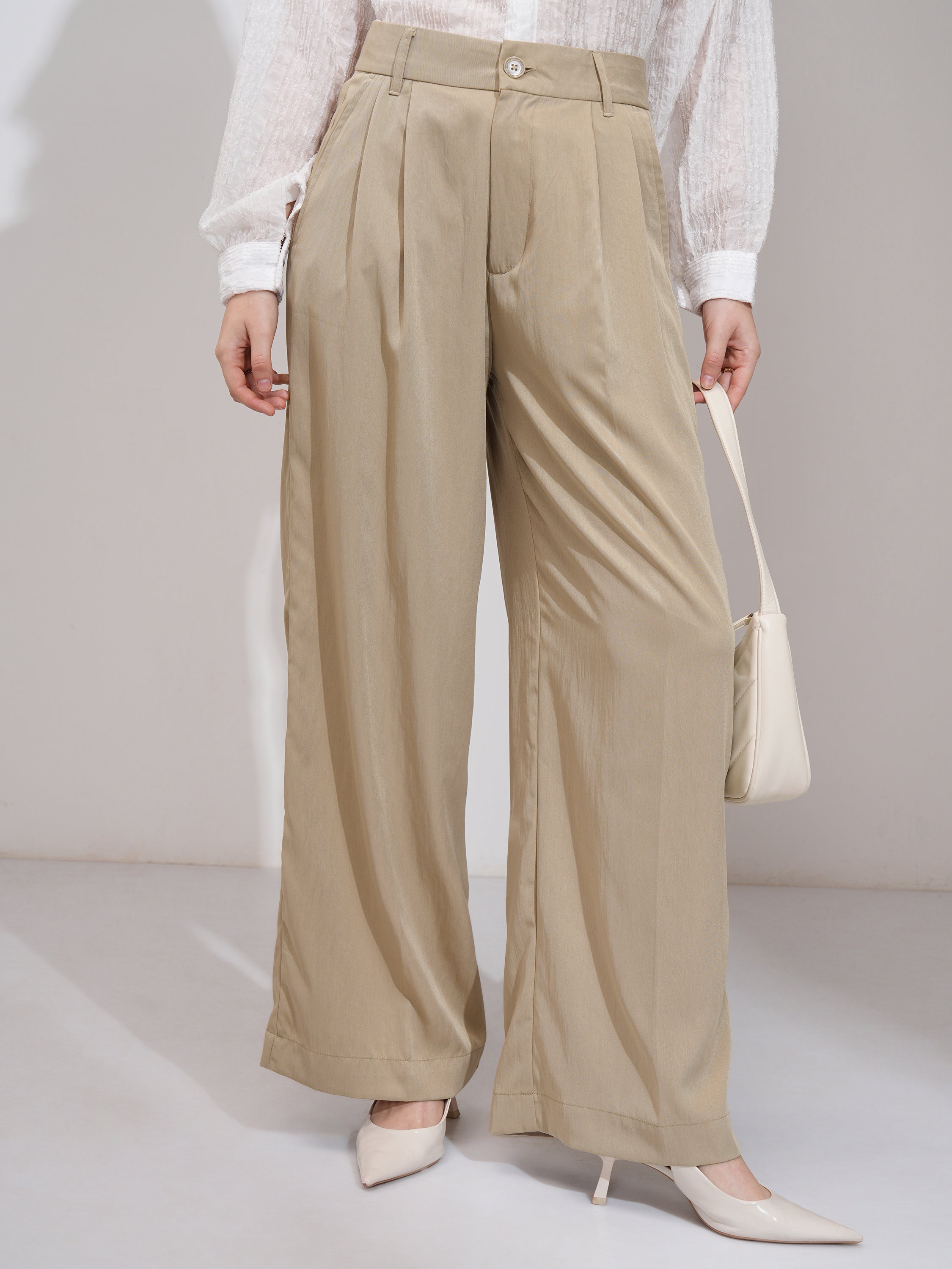 Tokyo Talkies Women Beige Solid Flared Casual Trouser - Beige - Image 1