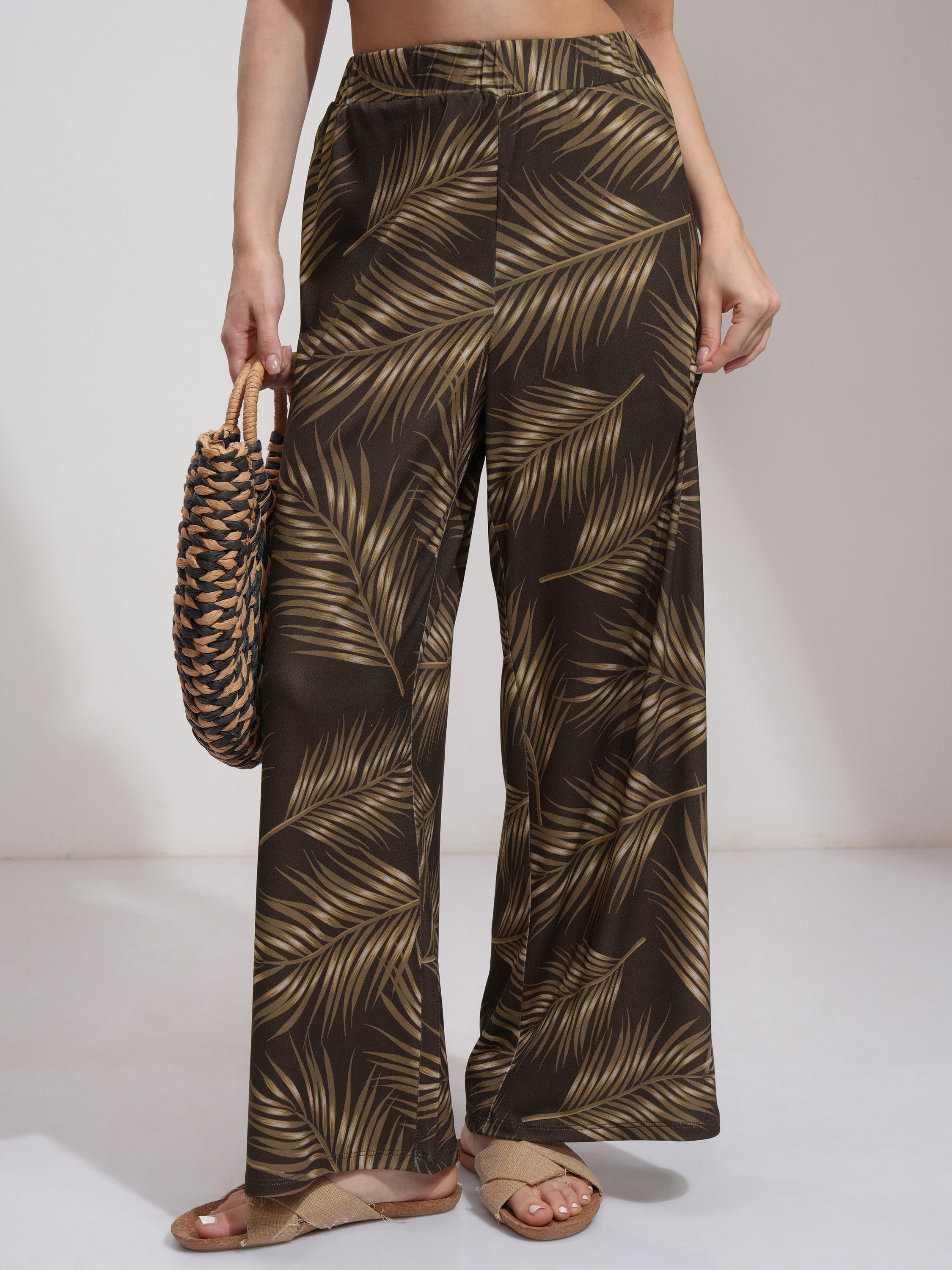 Tokyo Talkies Women Brown Printed Flared Casual Trousers - Brown - Image 1