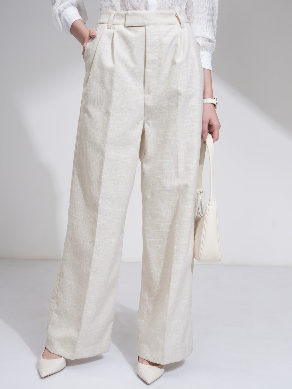 Tokyo Talkies Women Beige Solid Flared Casual Trouser - Beige - Image 1