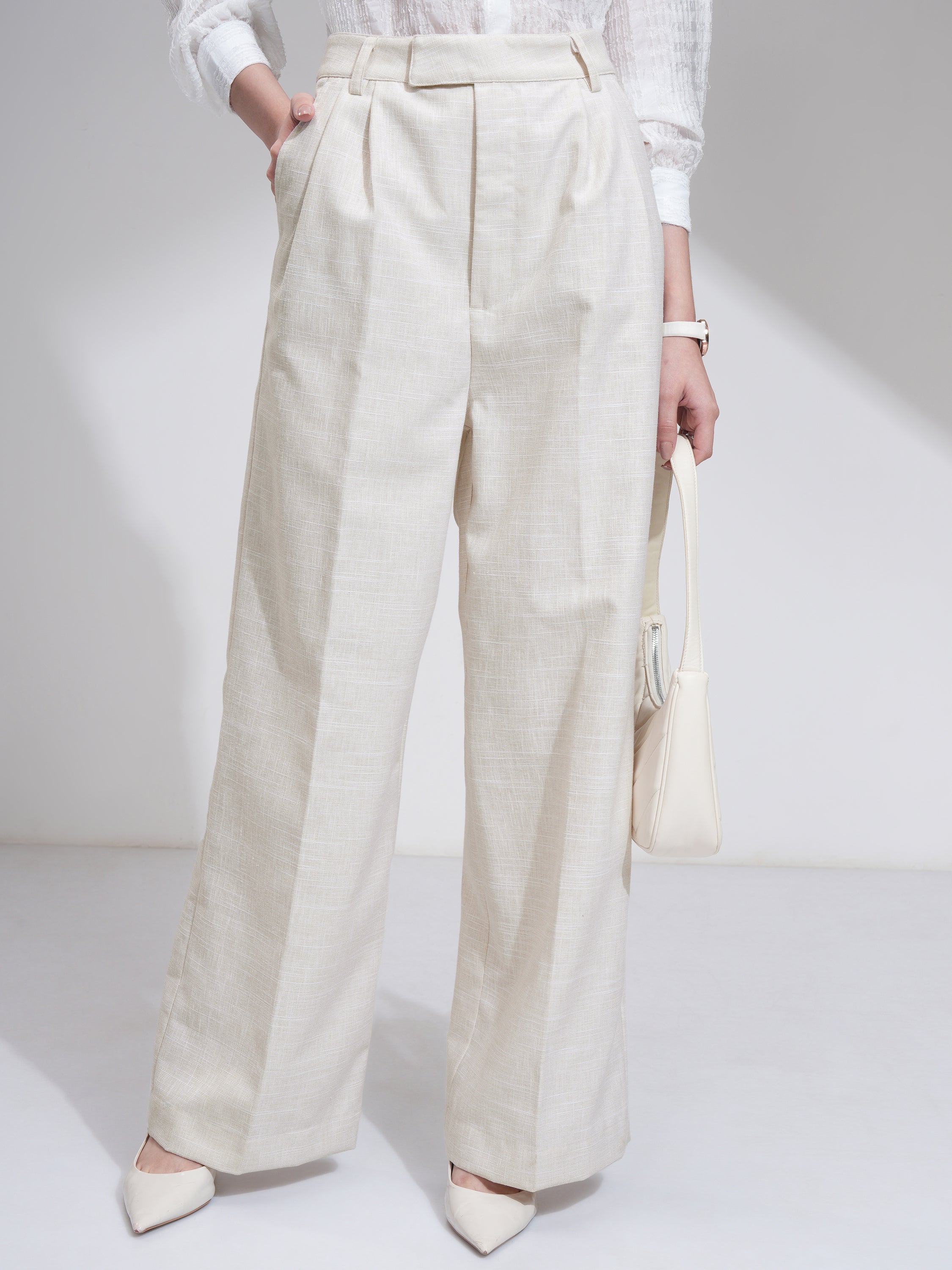 Tokyo Talkies Women Beige Solid Flared Casual Trouser - Beige - Image 1