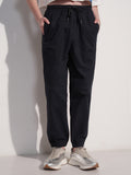 Tokyo Talkies Women Black Solid Regular Fit Joggers - Black - Image 1