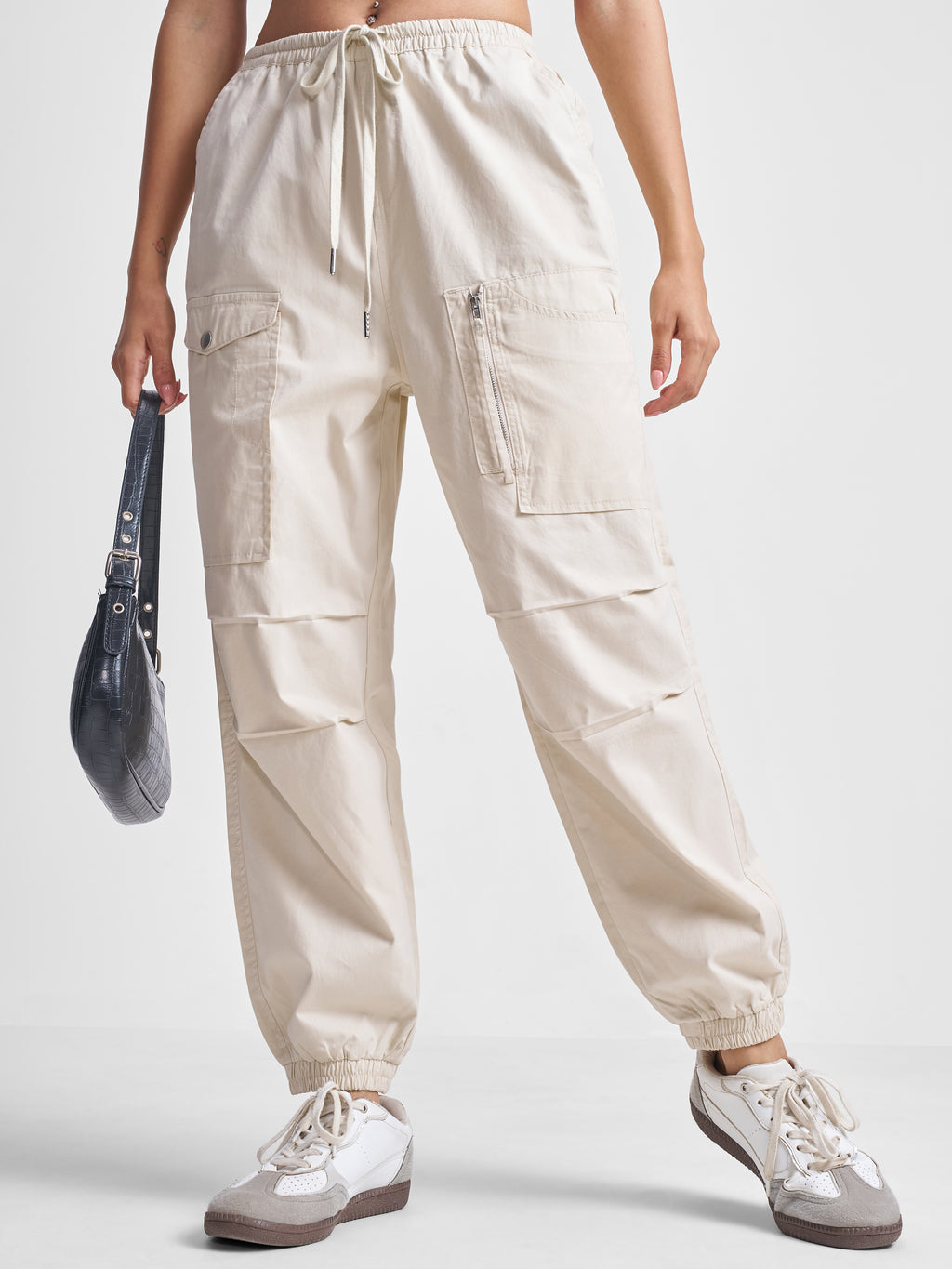 Tokyo Talkies Women Off White Solid Regular Fit Cargos - Off White - Image 1