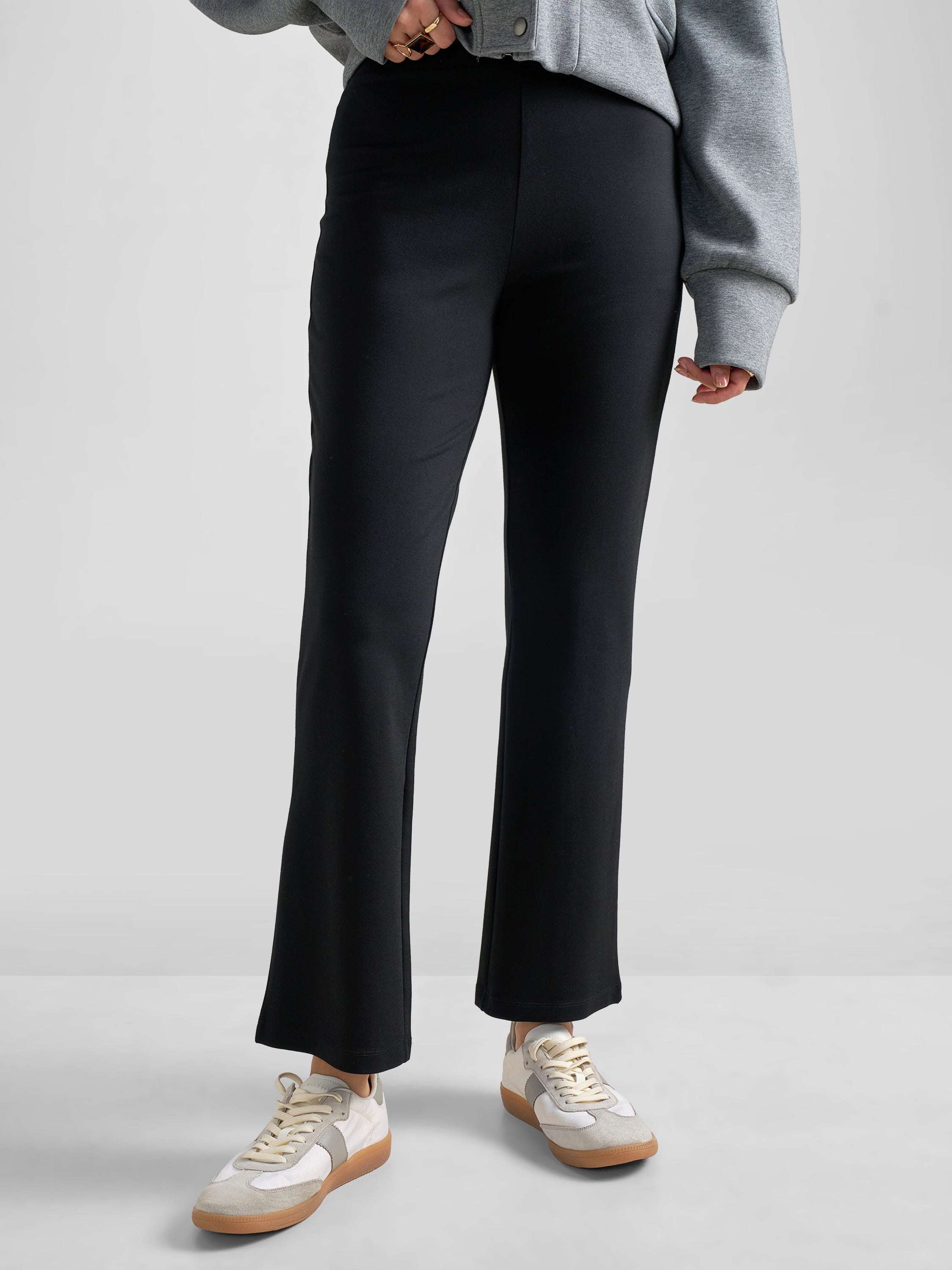 Tokyo Talkies Women Black Solid Bootcut Regular Trouser - Black - Image 1