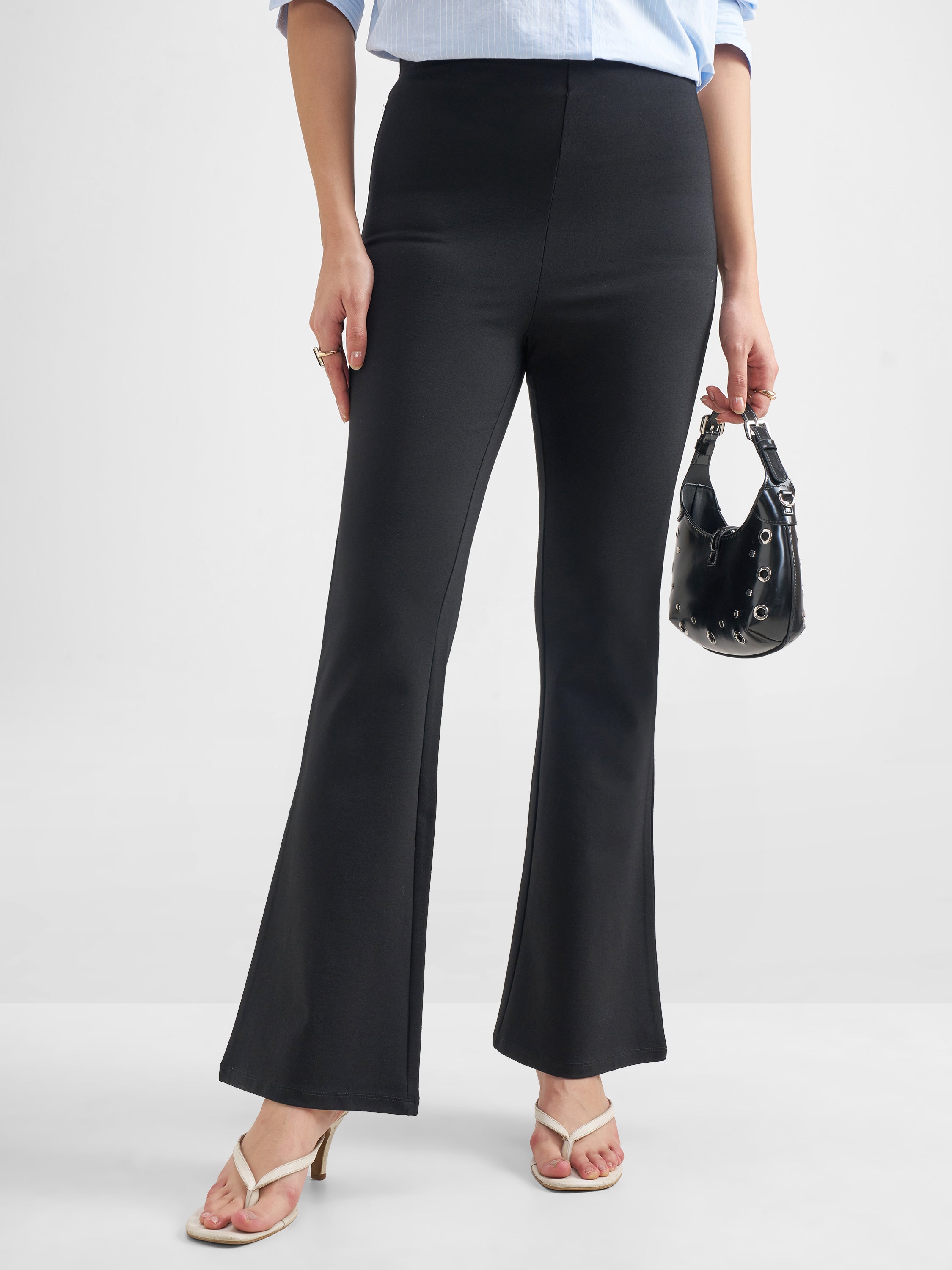 Tokyo Talkies Women Black Solid Bootcut Regular Trouser - Black - Image 1