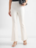 Tokyo Talkies Women White Solid Bootcut Regular Trouser - White - Image 1