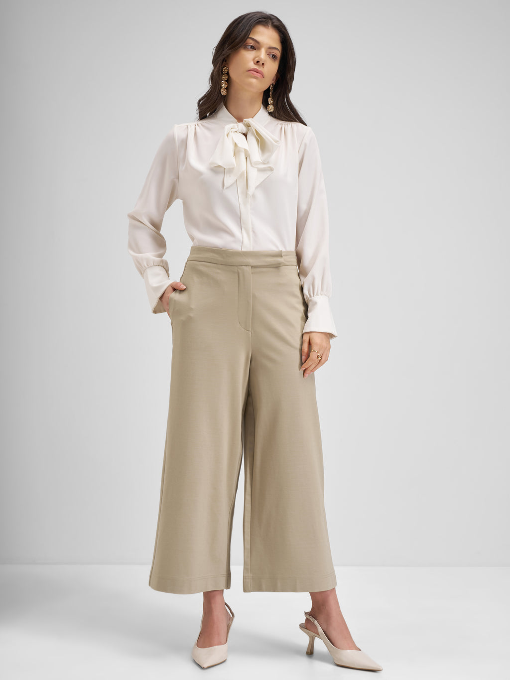 Tokyo Talkies Women Beige Solid Loose Fit Regular Trouser